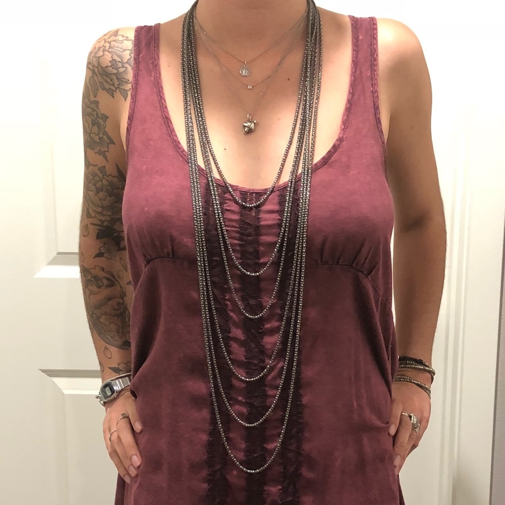• Buy one, get one free • Silver necklace set